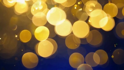 Wall Mural - christmas golden light shine particles bokeh on navy blue background. holiday concept. abstract back