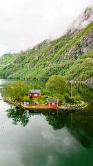 Wall Mural - A Tranquil Island Home in Norway's Fjord, Lovrafjorden, Norway