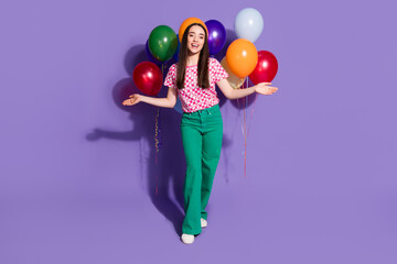 Poster - Full size photo of pretty young girl air balloons congratulate party wear trendy pink outfit isolated on purple color background