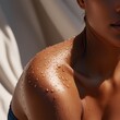 © KLSHKA - tanned female shoulder with water droplets
