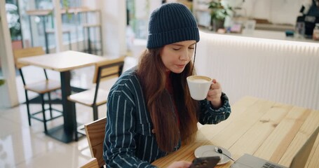 Wall Mural - Drink, woman and relax with smartphone in coffee shop, freelance blogger and online entrepreneur as content creator. Girl, laptop and happy in cafe, creative director and internet for trend search.