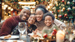 © Anoo - A joyful family of four shares laughter and togetherness during a festive Christmas dinner in a warm, inviting restaurant atmosphere