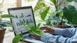 © DigitalMagicVisions - Businessperson Leveraging Data for Sustainability with ESG Analytics on Laptop