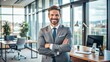 © Rafay - Successful Businessman Smiling in Office - Professional Image for Business Use