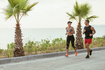 Poster - Couple Jogging Near The Sea