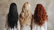 © Maria Vitkovska - Three women showing long healthy hair from behind