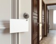 © Avve Diana  - A blank door hanger flyer white with white tags isolated for design template. This image is a 3D rendering of the flyer.