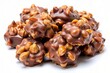 © Autun - Delicious creamy chocolate peanut clusters isolated on transparent background, showcasing caramelized peanuts smothered in rich velvety chocolate, perfect for sweet treats and desserts themes.
