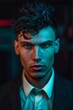© VISUAL BACKGROUND - A man with blue eyes in a dark room