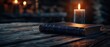 © FoxGrafy - Antique Leather-Bound Book on Wooden Table with Candlelight in Dark Rustic Setting