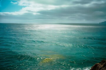 Wall Mural - a view of the ocean from the top of a cliff