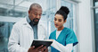 © peopleimages.com - Surgeon, teamwork or doctors with tablet, results or people reading health treatment in hospital. Meeting, planning or online medical advice on clinic app for web consultation or diagnosis research