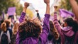 © ckybe - Defending women's rights and promoting female empowerment at a strong demonstration on International Women's Day, adorned in shades of purple.
