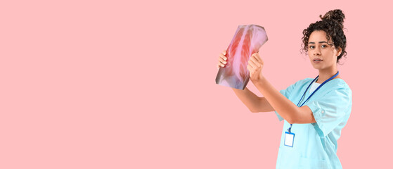 Poster - Female African-American medical intern with x-ray image of lungs on pink background