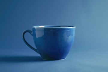 Aufkleber - A lone blue coffee cup sits on a table, perfect for a morning pick-me-up or afternoon break