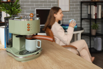 Poster - Coffee machine on counter in office, closeup