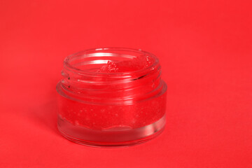 Canvas Print - Scrub jar on red background