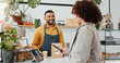 © PeakPoints/peopleimages.com - Woman, smartphone and tablet with cashier in coffee shop to pay for sale, ecommerce and digital checkout. Customer, happy and technology for internet banking, payment and online transaction in cafe.