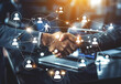 © Роман Варнава - Global business collaboration through handshakes and technology innovations in modern corporate environments