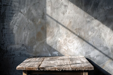 Poster - Empty wooden table top casting a shadow on a grunge concrete wall background, displaying a minimalist and rustic aesthetic