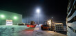 © ADDICTIVE STOCK - Industrial Night Scene with Railway Sleepers and Forklift