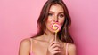 © afif - munching a lollipops, beautiful girl. Gorgeous model lady devouring vibrant, colorful lollipops on a pink backdrop, Generative AI.