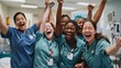 © Lakkhana - A diverse group of nurses celebrating a successful patient recovery