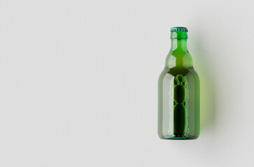 Poster - Green steinie beer bottle mockup with a blank copyspace.