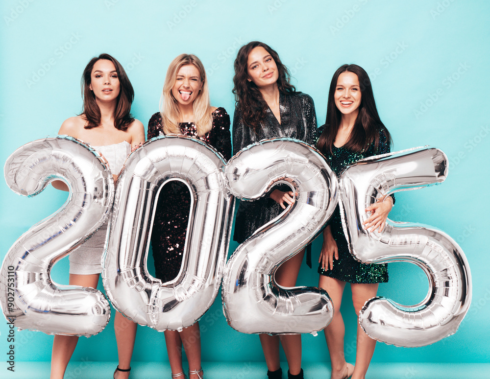 Four Beautiful women celebrating New Year. Happy gorgeous female in ...