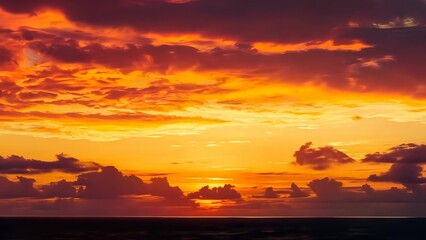 Wall Mural - Dramatic sunset over the ocean with vibrant