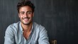 © WS Studio 1985 - Confident Charisma: A portrait of a young man with a captivating smile, exuding confidence and approachability against a textured background.