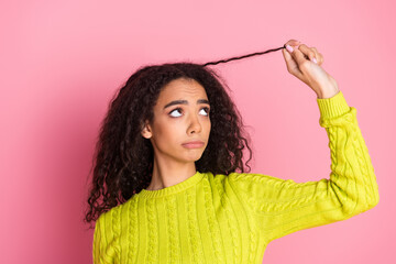 Wall Mural - Portrait photo of youth model teenager girl touching her coiffure after using shampoo for hair isolated on pink color background