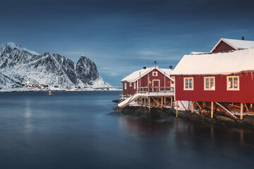 Wall Mural - lofoten islands, reine, norway and hamnoy fishing village with red rorbuer houses in winter nature p