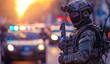© TigerDude - A special forces soldier in full gear, holding an assault rifle and wearing body armor with the blurred background of police cars on street with people walking by,