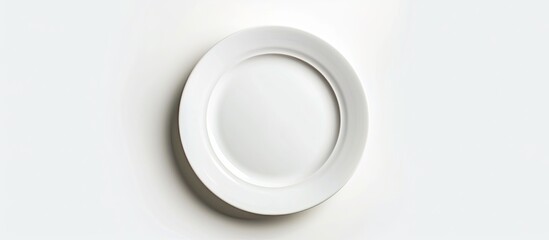 Leinwandbilder - An isolated plate on a white backdrop providing copy space image