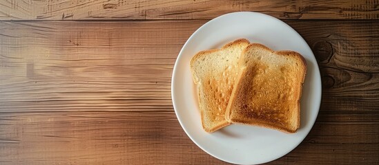 Poster - Place the toasted bread on a white plate over a wooden table with a designated copy space image