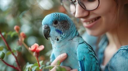 Sticker - a woman holding a blue bird