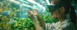 © BoOm - A woman engages with futuristic gardening technology using virtual reality gloves in a vibrant greenhouse setting.