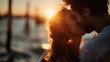 © svastix - A heartwarming scene of a couple locked in a passionate kiss as the sun sets over a peaceful body of water, with golden, dreamy light enhancing their intimate moment.