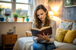 © Volodymyr - Young attractive woman reading bible in cozy room