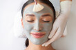 © Home-stock - Closeup view of facial rejuvenation procedure with beauty mask, woman enjoy receiving spa treatments in salon, top view