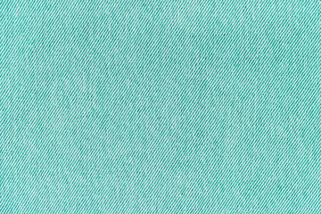 Canvas Print - Closeup, macro of turquoise jeans denim fabric texture background, cloth with diagonal weawing