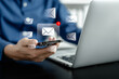 © sirichai - Businessman using smartphones check New email notifications and business digital online marketing. Inbox receiving electronic message alert. icon envelope virtual screen, communication technology.