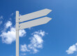 © MP - Blank signpost. Road sign. Mockup. Arrows. Blue sky. 3d illustration.