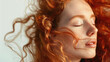 © Tati - Young woman with red curly hair and closed eyes