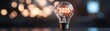 © May Chanikran - A glowing light bulb with the year 2025 inside, symbolizing innovation, ideas, and the future of technology.