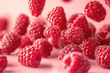 © darshika - Various falling fresh ripe raspberries on light pink background  horizontal composition
