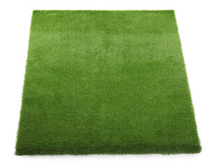 Wall Mural - Green artificial grass isolated on white, top view