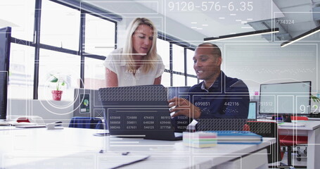 Poster - Analyzing data and collaborating over digital interface in modern office image