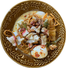 Lontong Sayur Medan, Traditional Indonesian Food from Medan, North Sumatra,  Compressed Rice Cake or Lontong with Chayote and Long Beans Cooked in and Spices, Coconut broth with vegetables, egg.